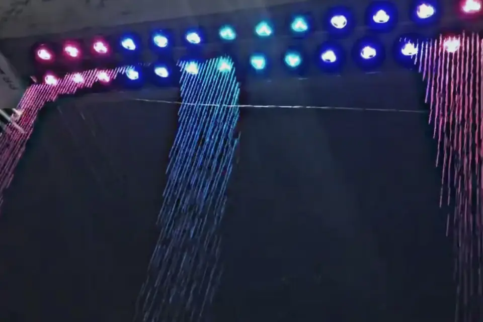 Digital water curtain displaying programmable patterns and text