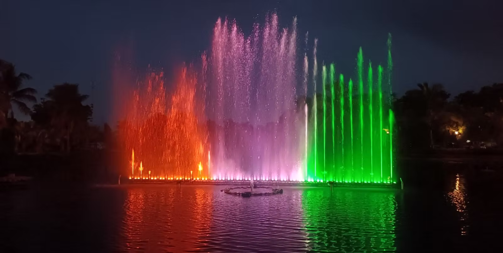 Musical fountain system manufactured by Dhyani Technologies in India with synchronized water jets, colorful LED lights, and music integration.