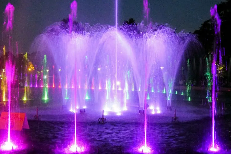 Multimedia musical fountain with laser, lights, and water projection