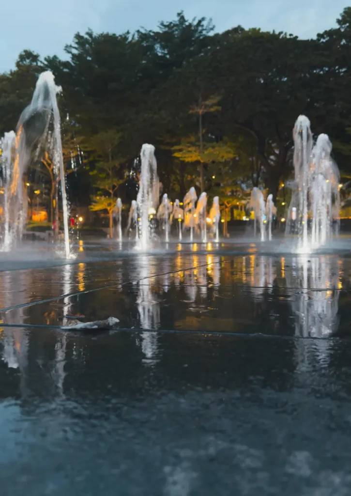 Dry deck fountain installed in shopping mall public space interactive water feature