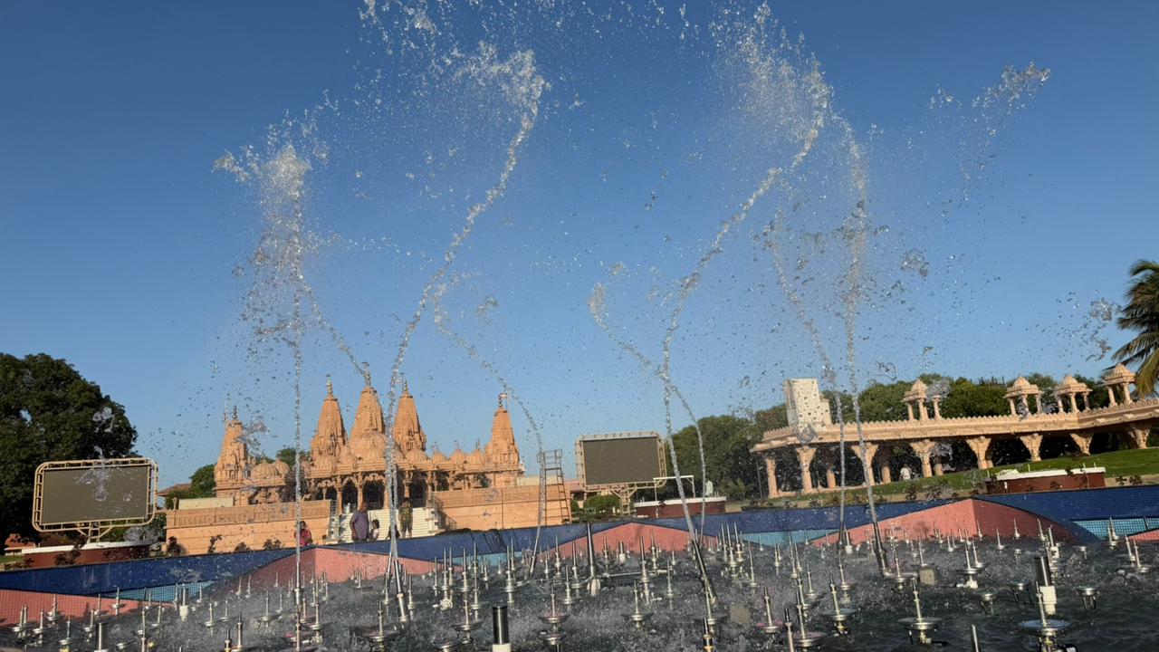 1. Main Multimedia Water Show Alt Text: Multimedia water show at BAPS Swaminarayan Mandir Sankari Surat Title: Multimedia Water Show at BAPS Mandir Sankari Caption: A spectacular multimedia water show blending dancing water, colourful lighting, music and devotional storytelling. Description: Dhyani Technologies presents a 50-foot multimedia water show at BAPS Swaminarayan Mandir, Sankari, Surat, powered by the advanced SyncD Pro control system. 2. Circular Musical Fountain Alt Text: Circular musical fountain at BAPS Mandir Sankari Surat Title: 50-Foot Circular Musical Fountain Caption: A grand circular fountain layout designed for immersive water-show performances. Description: The 50-foot circular musical fountain features synchronized water effects, moving jets, underwater RGB lighting and multimedia projection. 3. Dancing Water and Lighting Alt Text: Dancing water jets with RGB lighting at BAPS Sankari