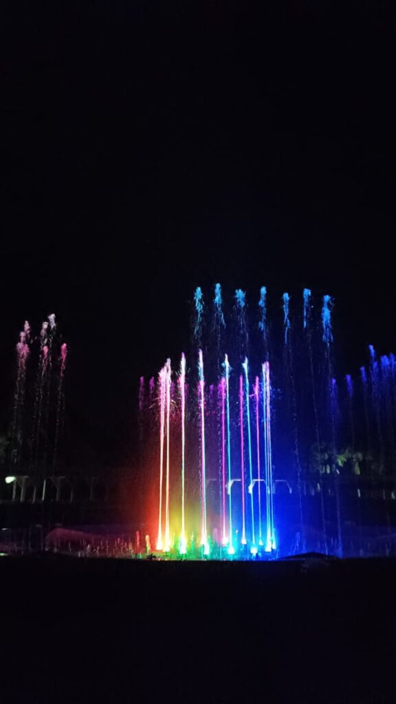 Straight fountain jets synchronized with colourful underwater lights